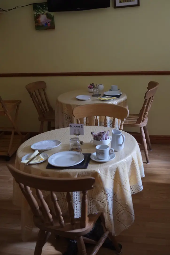 Breakfast table prepared for Woodville guests